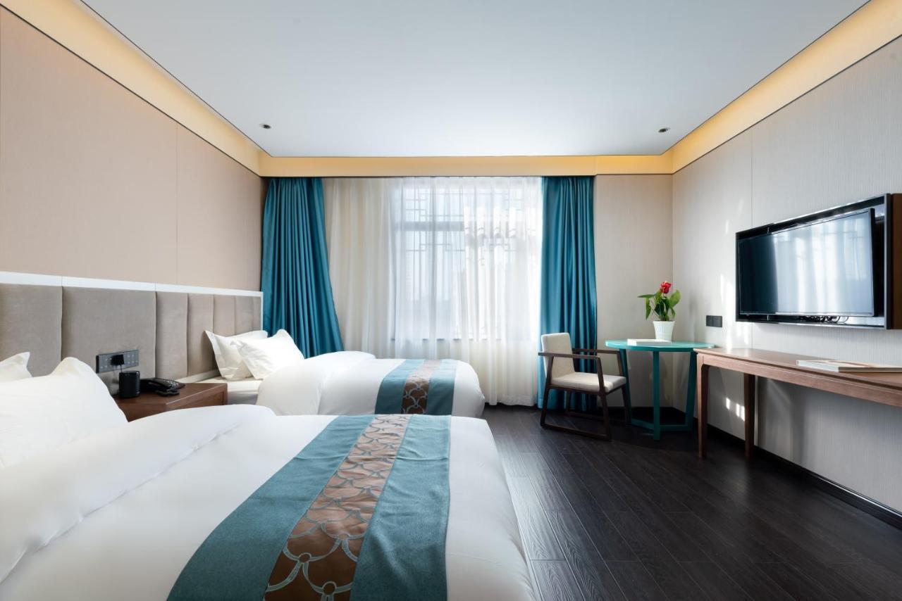 Beijing Tangfu Hotel - Located In The City Center Adjacent To The Subway Station Close To Nanluoguxiang Gulou Lama Temple Tiananmen Square Forbidden City Temple Of Heaven Providing Laundry Car Rental And Ticketing Services Bagian luar foto